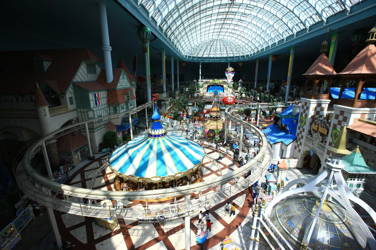 The large indoor Adventure atrium with a carousel roof and elevated track